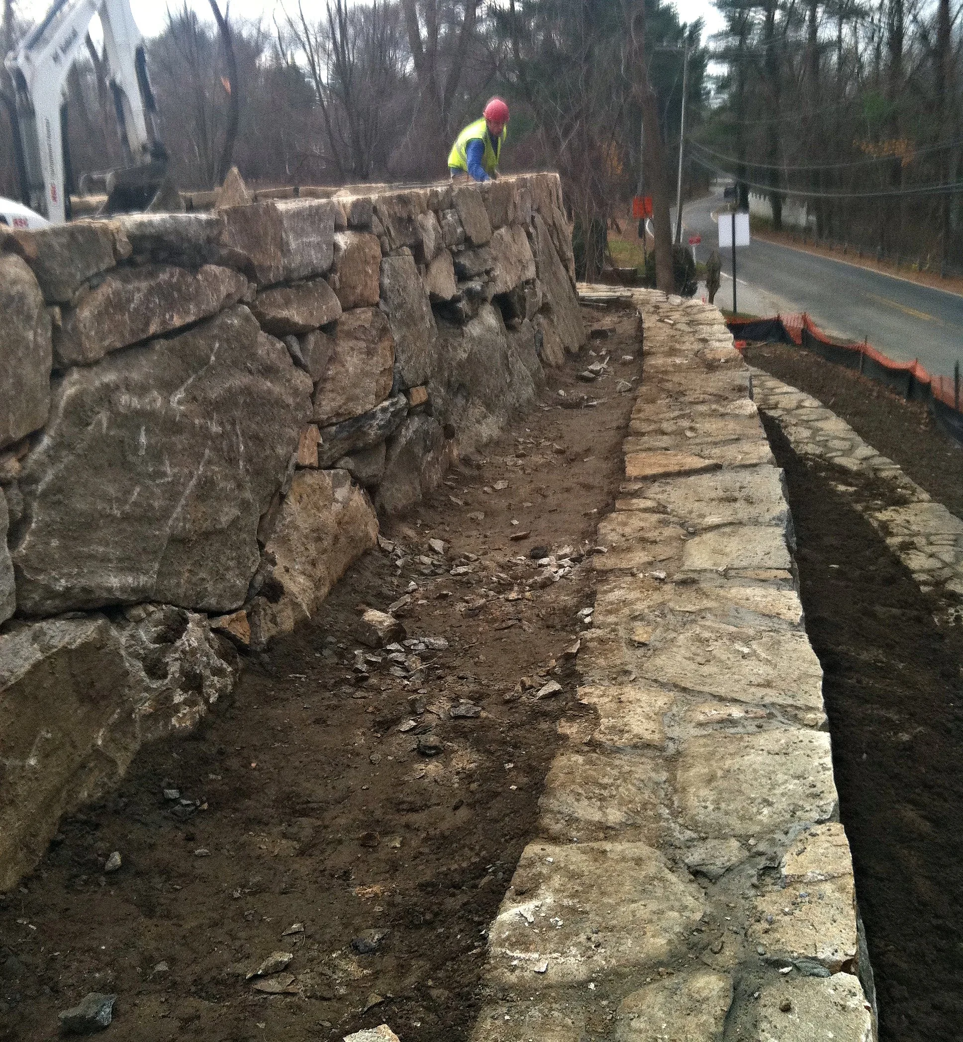 Natural stone retaining wall completed section Stanwich