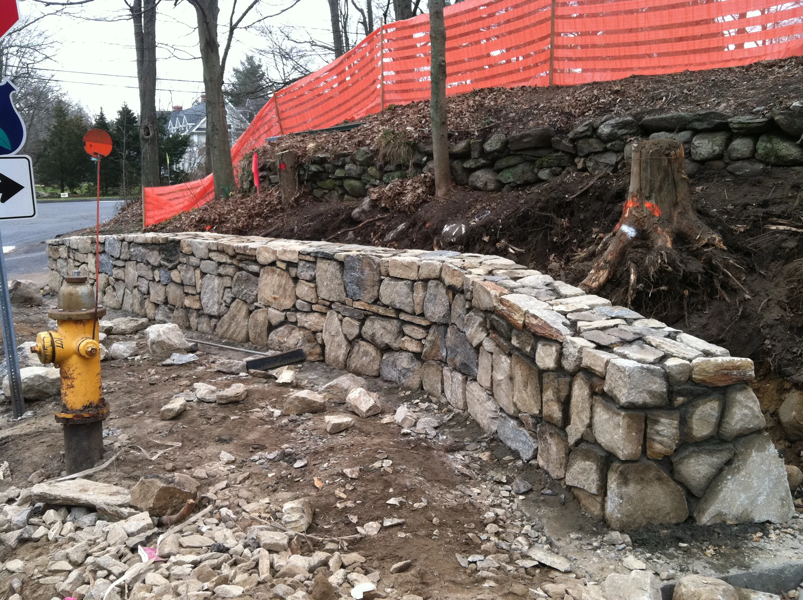 Stone wall under construction New Canaan CT