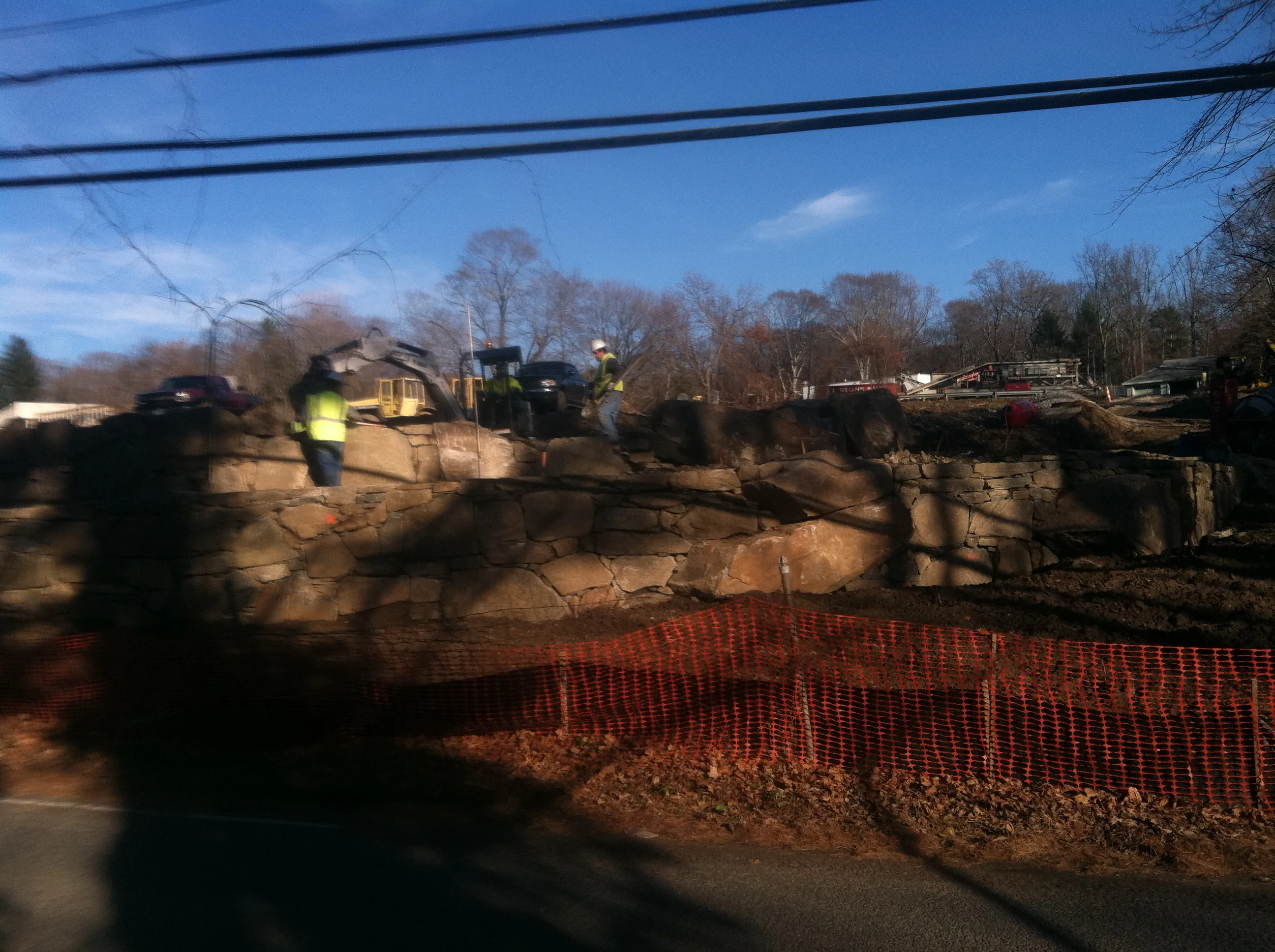 Stone retaining wall construction Stanwich School