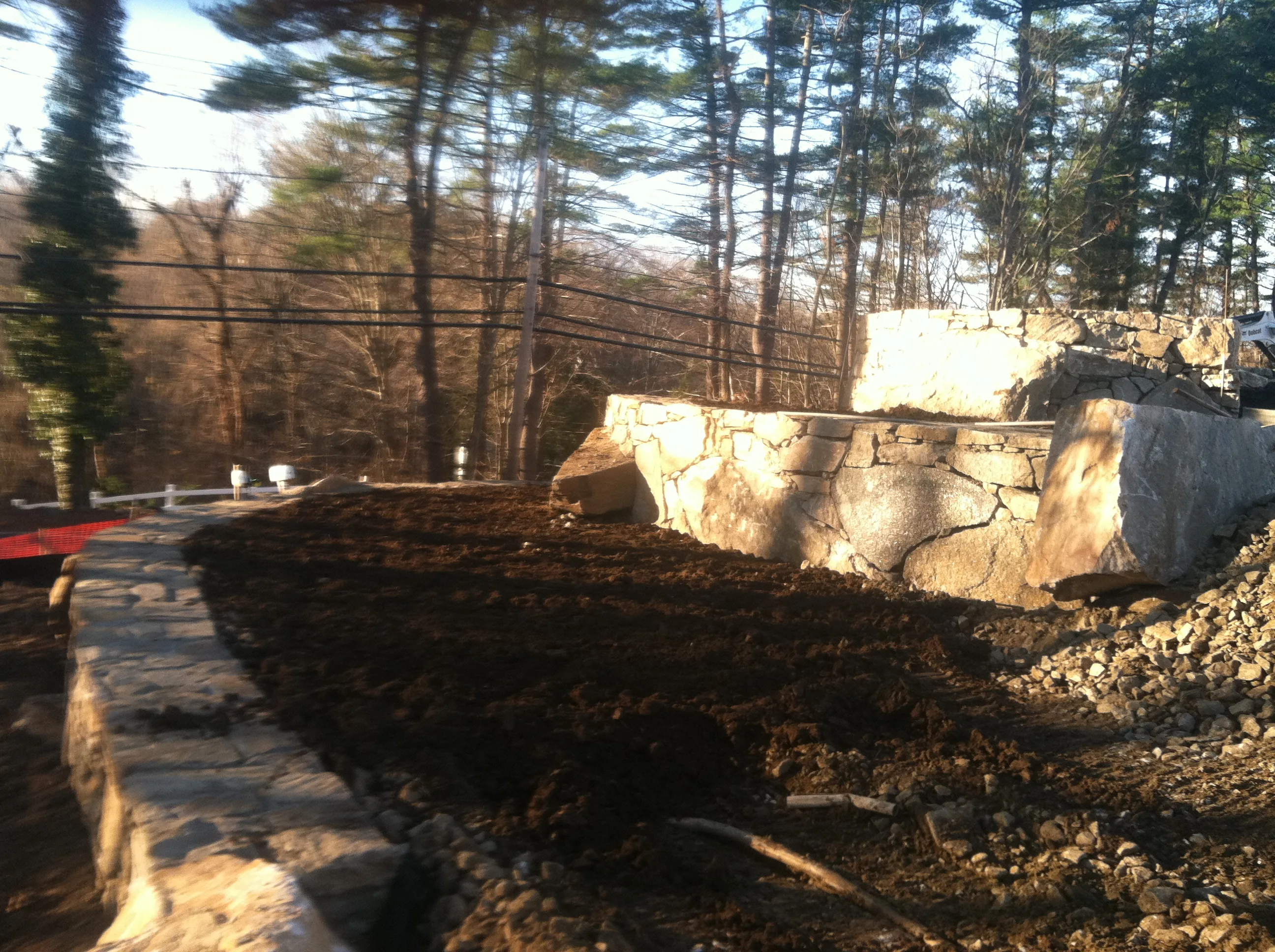 Tiered stone wall progress Stanwich School Greenwich