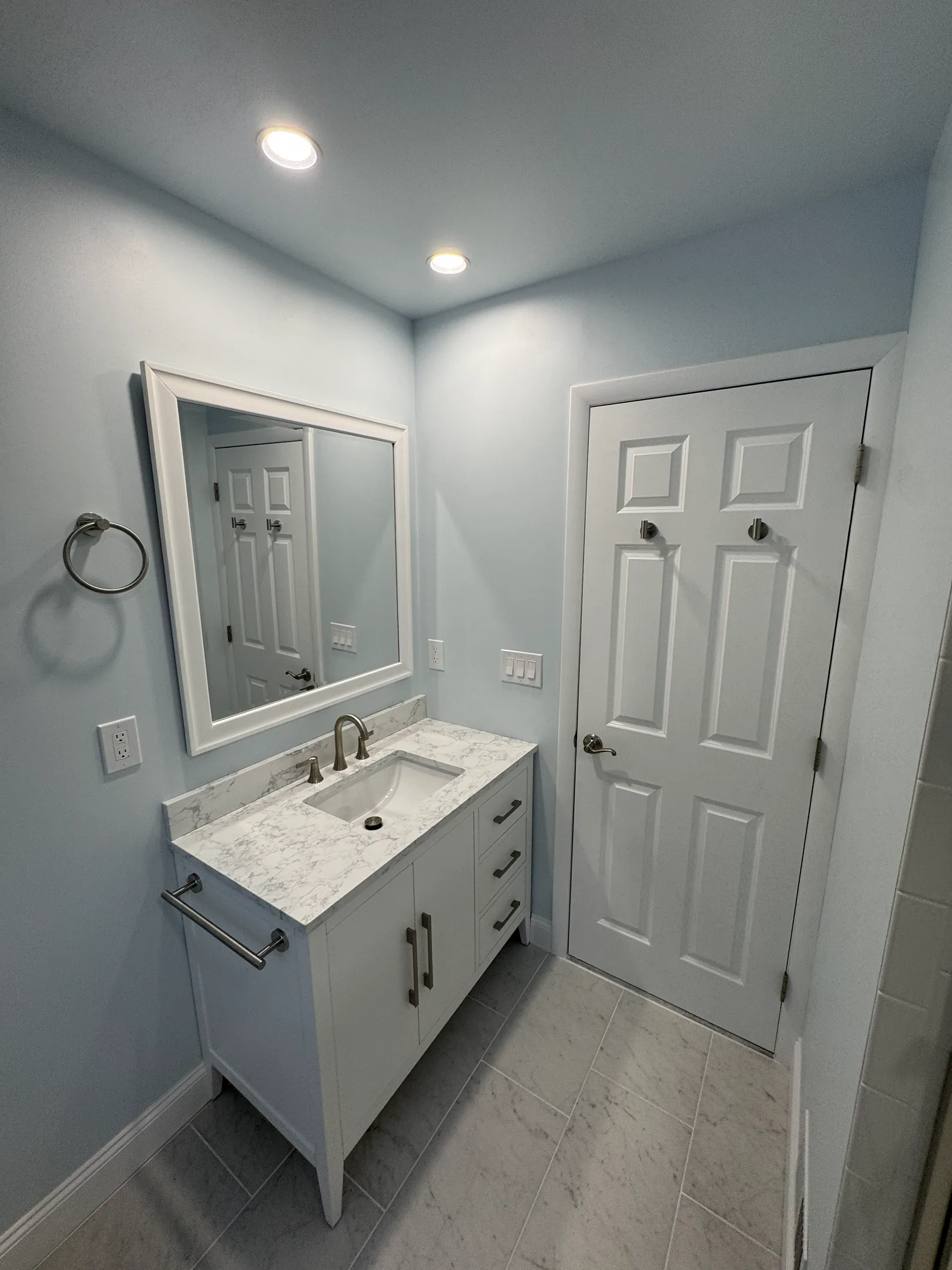 Modern bathroom vanity with marble countertop