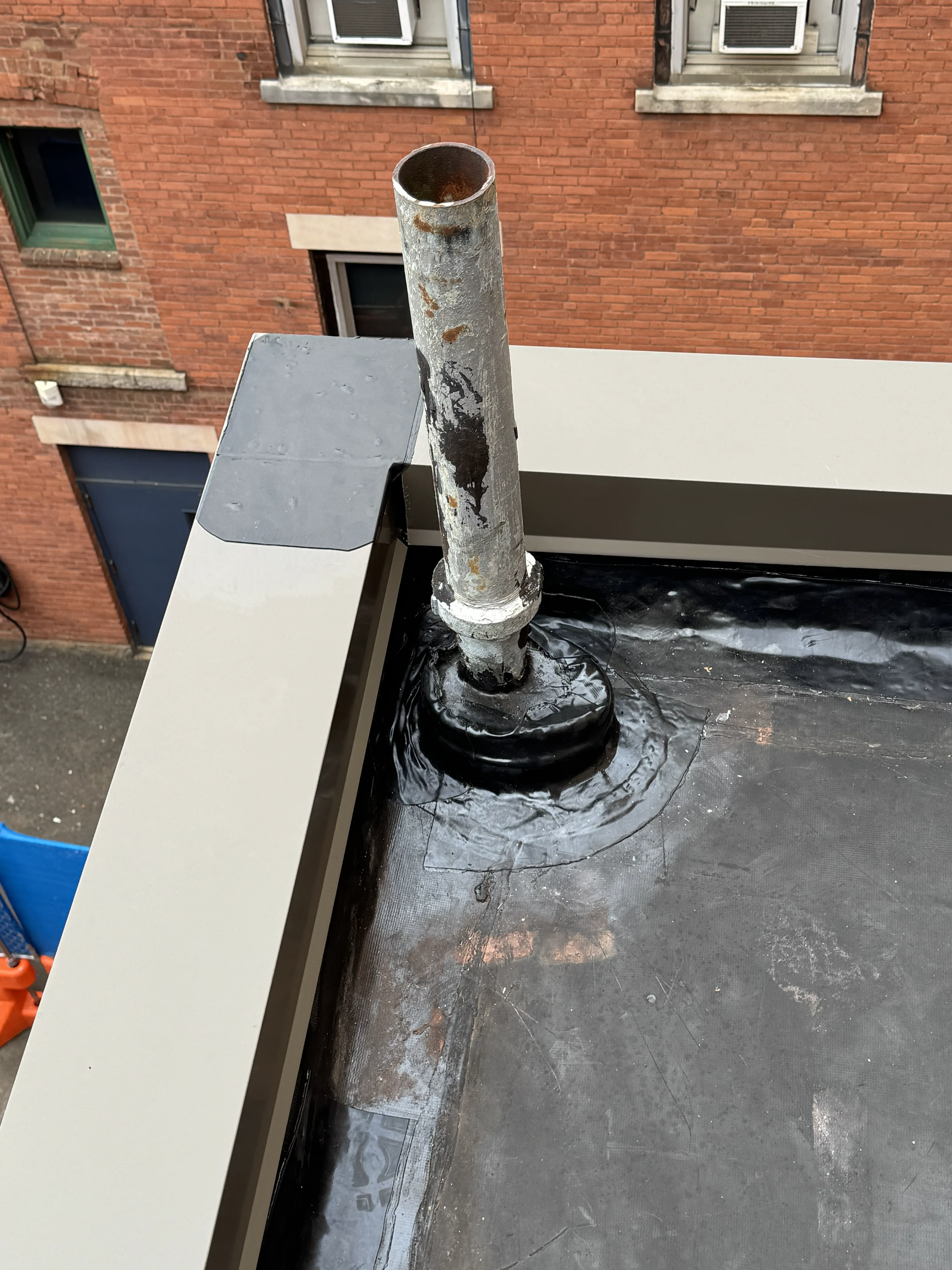 Parapet brick repair and repointing