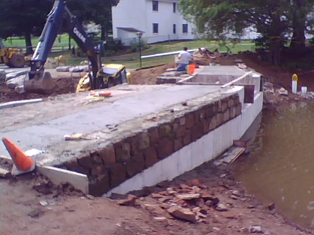 Stone dam construction progress Wallingford CT